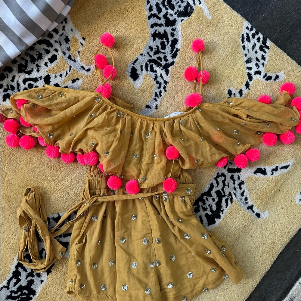 Anthropologie gold romper with Pink Pom Poms